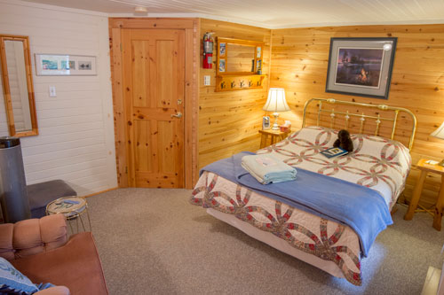 A Blair bend riverside bedroom with wooden door